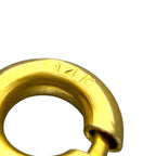 Gold bail/jump ring with engraved marking and connecting loop.