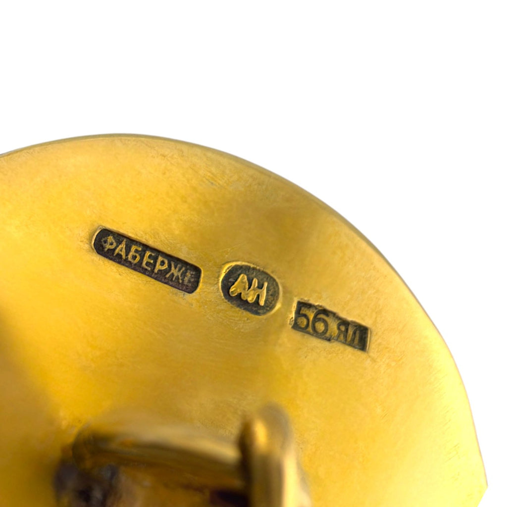 Close-up of yellow gold cufflink back with Faberge and 56 assay hallmarks
