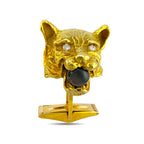 Gold panther head cufflink with dark round smoky stone and small diamonds, on bar backing
