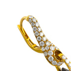 Close-up of the yellow gold earring top, set with round diamonds and a hinged clasp