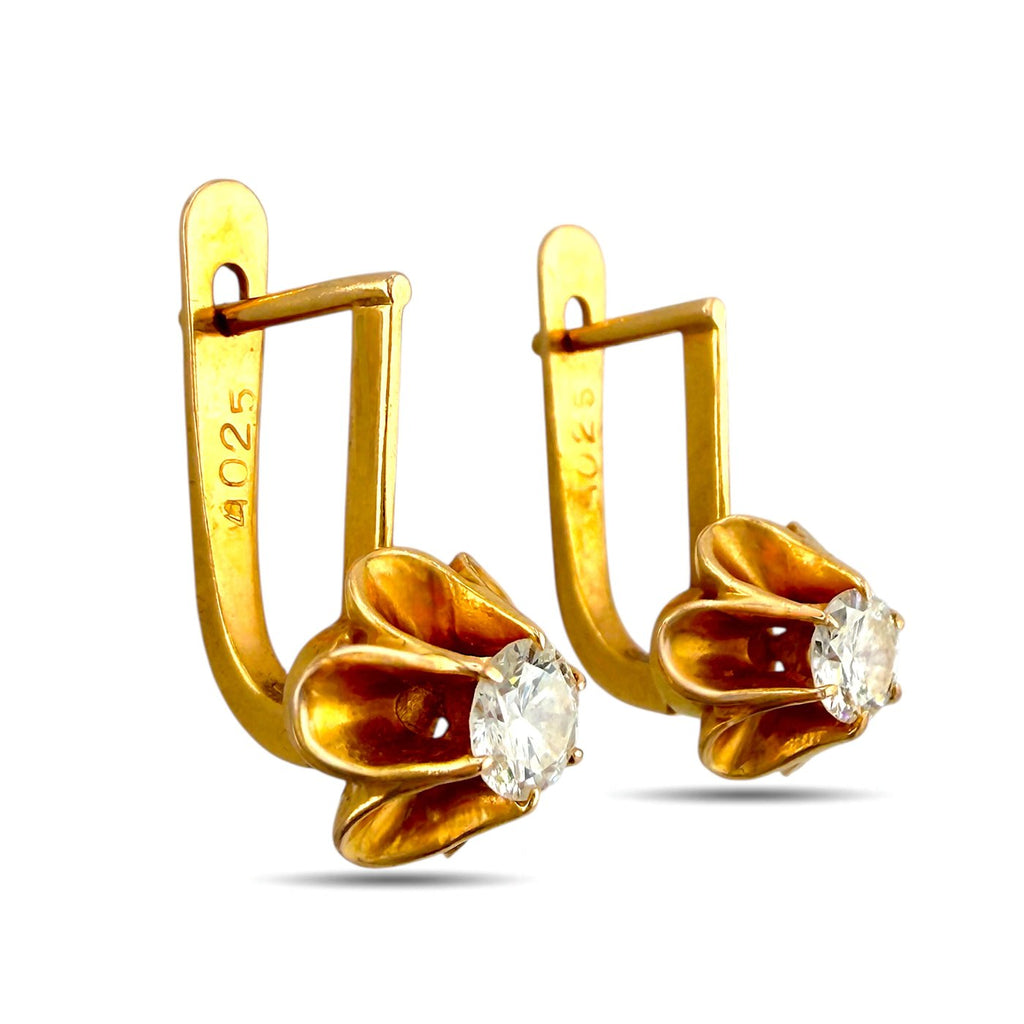 Gold-tone hinged clip earrings with round clear stones in petal settings