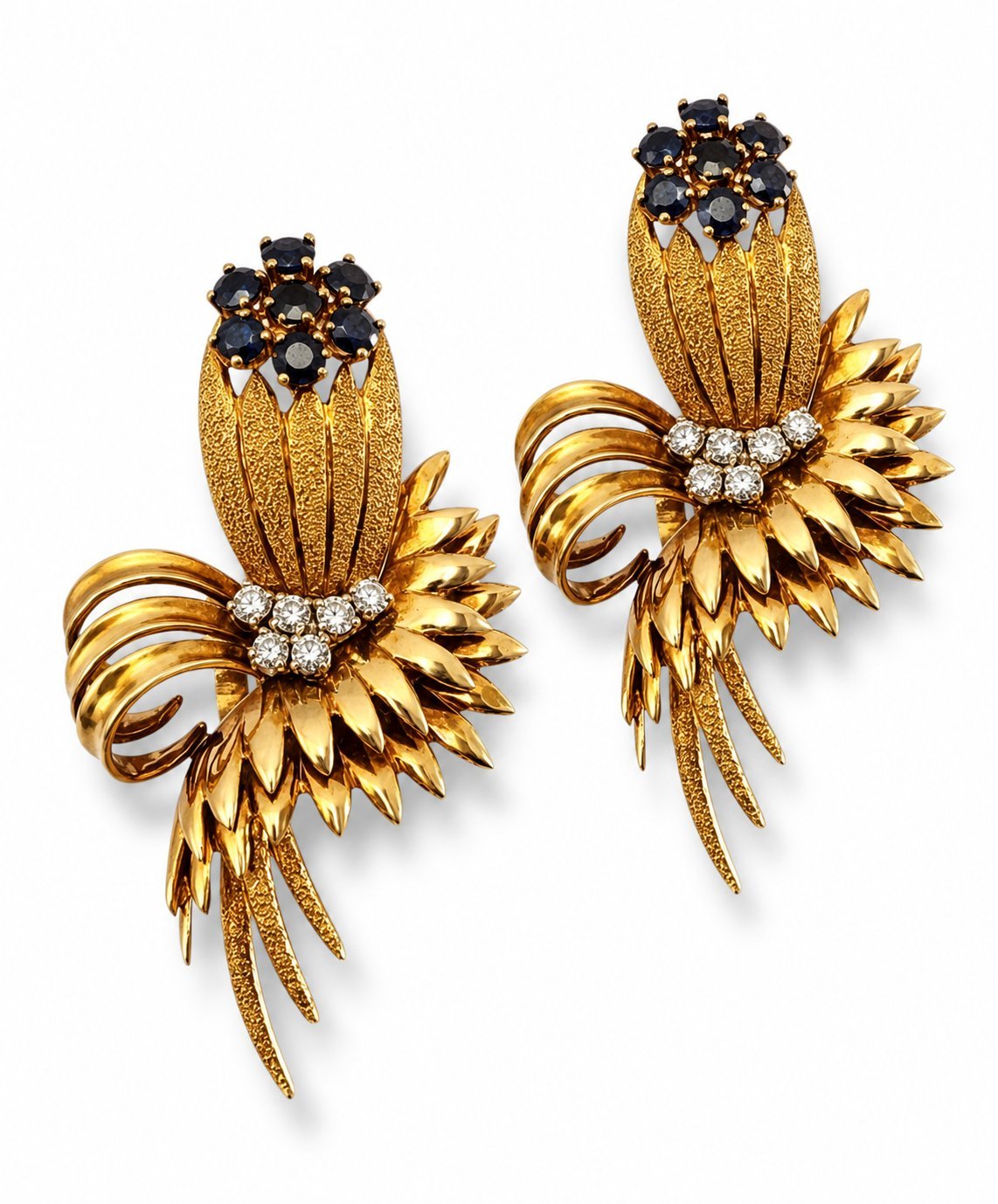 Pair of gold fan earrings with dark blue stone crowns and diamond flower centers