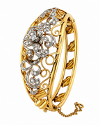 Victorian-style 18K yellow gold diamond bracelet with ornate openwork filigree and round clusters