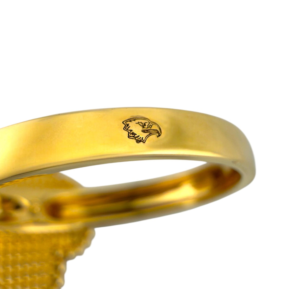 Van Cleef & Arpels ring close-up of an emblem stamped inside the gold band