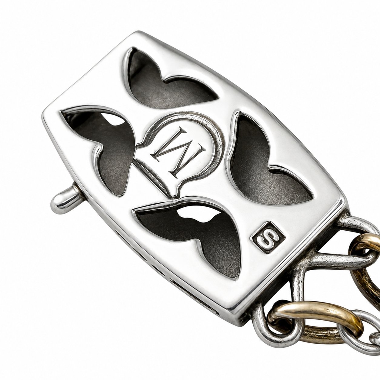 Rectangular pendant with black enamel hearts and “M” monogram in white gold