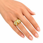 18K yellow gold diamond ring on hand, twin bands with round and baguette stones
