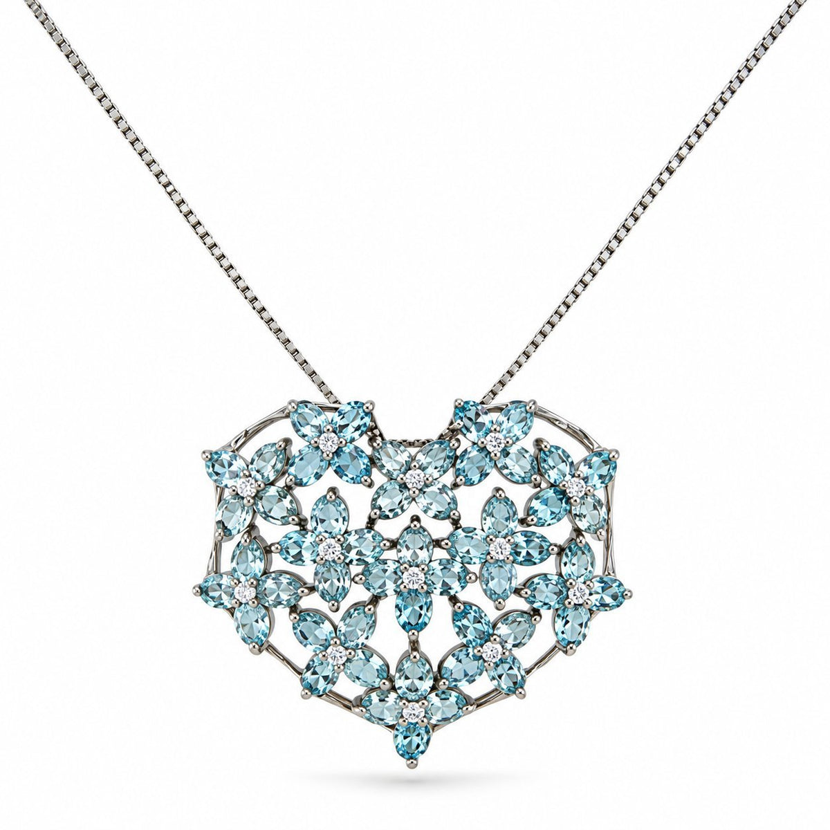 Heart-shaped blue gemstone pendant with diamond details, front view on chain