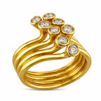 Sonia B. yellow gold ring with round diamonds on flowing multi-band swirls