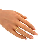 Tiffany & Co. diamond cross ring in 18k yellow gold on hand