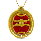 Back of coral face pendant showing gold setting and openwork