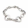 White-gold tone link bracelet with oval and circular interlocking links