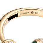 Yellow gold ring band with Au750 hallmark and serial engraving detail