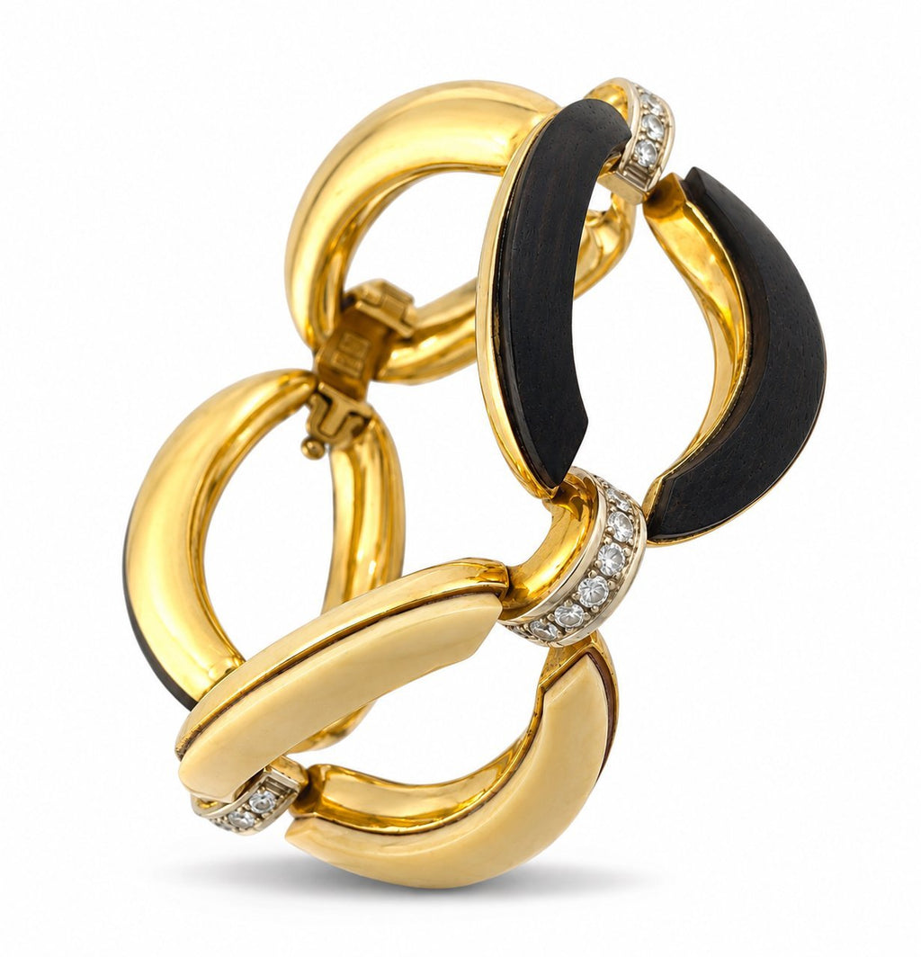 18K yellow gold link bracelet with black carved wood insets and diamond halo accents