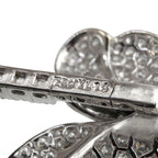 Close-up of the bracelet's 18K white gold hallmark and diamond setting