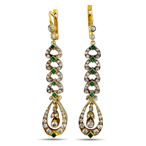 Gold dangle earrings with green emerald link stations and diamond accents, teardrop drops