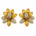 Textured yellow gold flower earrings with diamond-set petals and center