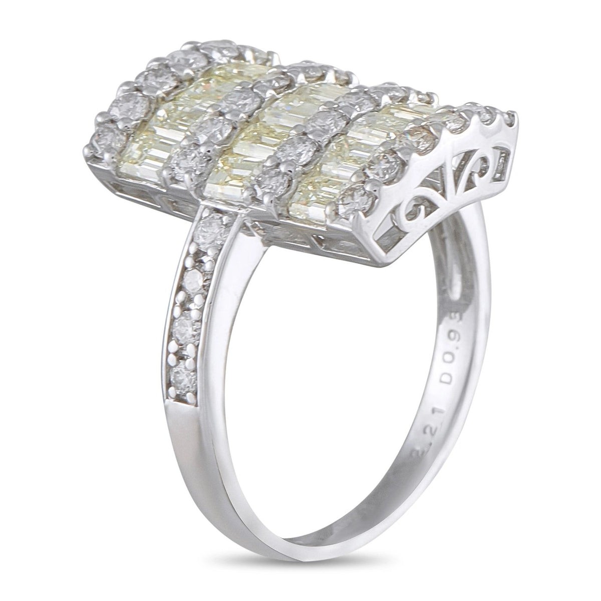Platinum diamond ring profile, baguette and round stones with lattice-style bridge detail