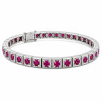 Platinum tennis bracelet with alternating ruby stones and box clasp