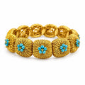 18K yellow gold turquoise bead bracelet with textured round links and blue flower accents