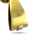 Gold bail and side view of cross pendant with stamped hallmark