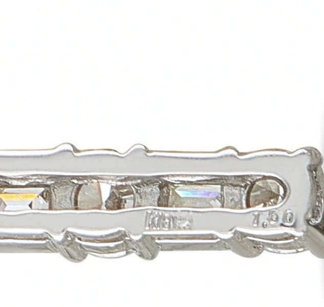 18K white gold diamond cross pendant bail detail with engraved hallmark area