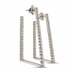 Platinum diamond drop earrings viewed from the back, showing the open frame and post backs