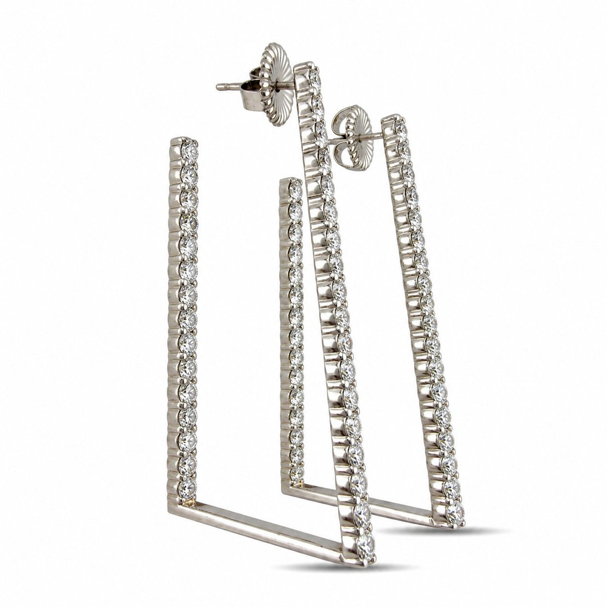 Platinum diamond drop earrings viewed from the back, showing the open frame and post backs
