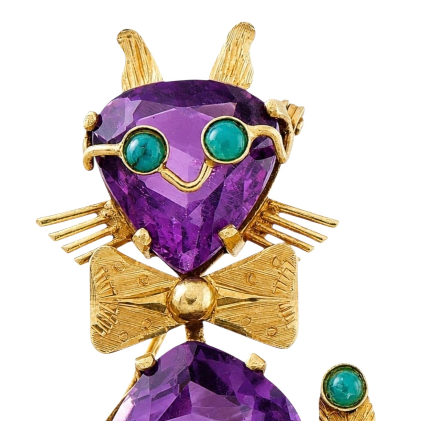 Gold cat brooch showing purple amethyst face with teal turquoise eyes
