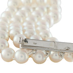 18K white gold pearl bracelet clasp with 750 hallmark, close-up