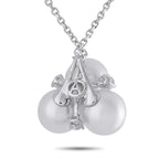 White gold pendant necklace with three-lobe pearl cluster and diamond set center