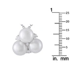 White gold necklace with three white pearls and diamond accents; size shown with ruler