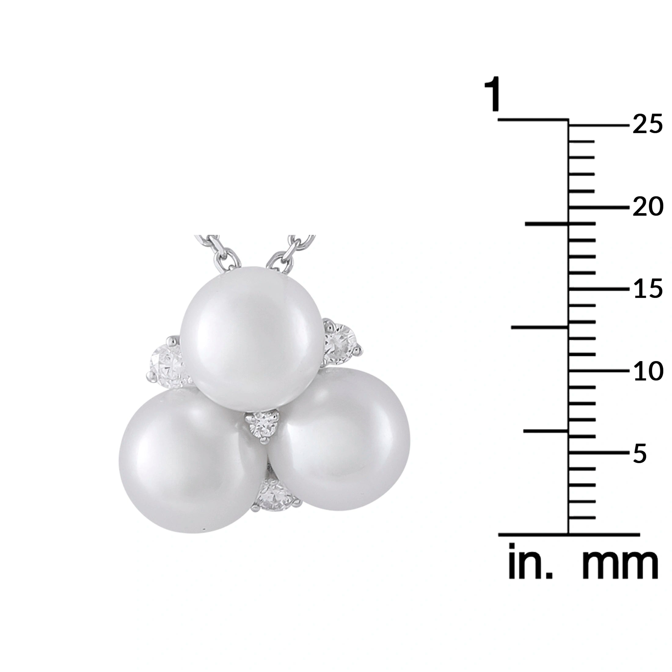 White gold necklace with three white pearls and diamond accents; size shown with ruler