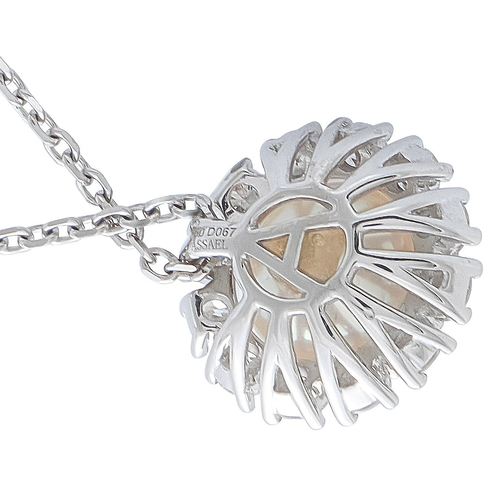 White gold pearl halo pendant in side view with openwork diamond-like details