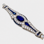 Art Deco sapphire and diamond platinum brooch with blue oval center stones