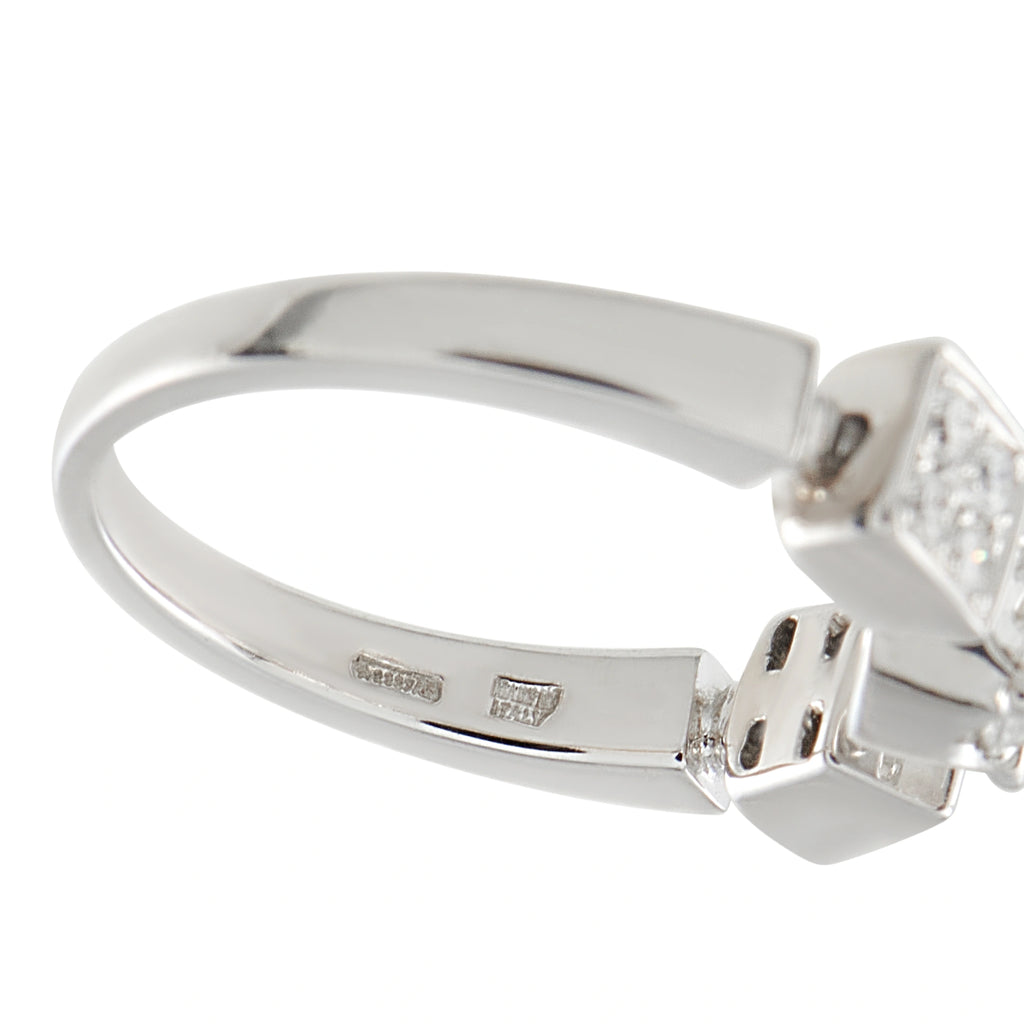 White gold diamond ring with prong-set round center and engraved band details