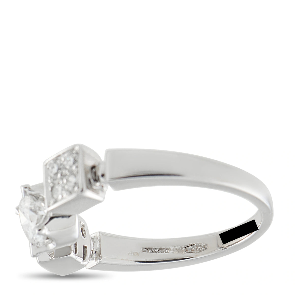 White gold diamond ring with round center stone and square side stones, side view