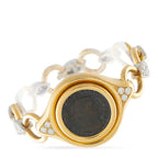 Yellow gold coin bracelet with black ancient-style center and small diamond accents