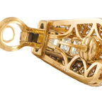 18K yellow gold diamond hoop earring close-up with Bvlgari hallmark