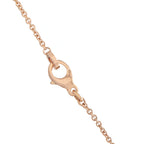 Close-up side view of rose gold B.zero1 pendant on a chain
