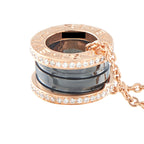 Rose gold B.zero1 pendant top view with black ceramic core and diamond edge