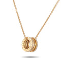 Rose gold diamond necklace pendant with concentric BVLGARI logo ring design