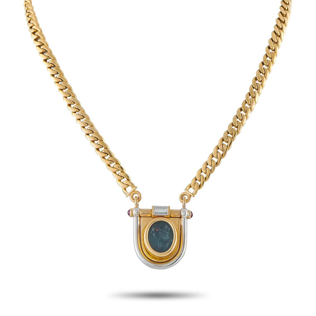 Gold necklace with shield pendant, blue oval intaglio and small diamond accents
