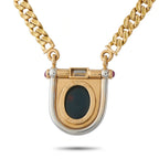 Gold pendant necklace with shield bezel, blue oval intaglio and purple ruby accents
