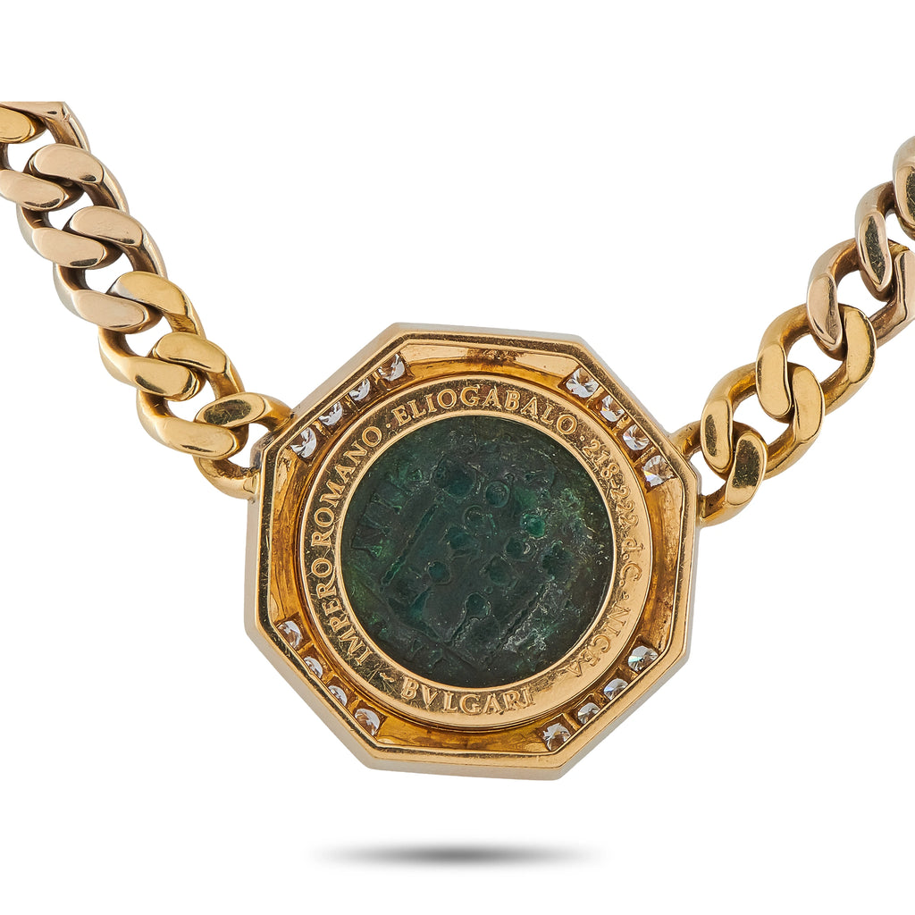 Octagonal pendant necklace with green coin face, diamond edge, and gold chain