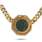 Octagonal pendant necklace with green coin face, diamond edge, and gold chain