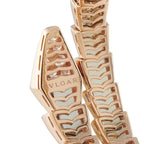 Bvlgari bracelet clasp close-up with engraved BVLGARI logo and scale-pattern links