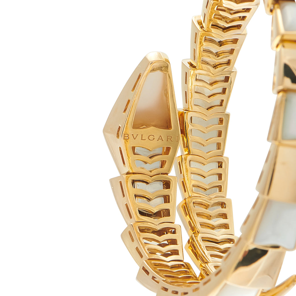 Gold bracelet clasp and engraved scale links with mother-of-pearl panels