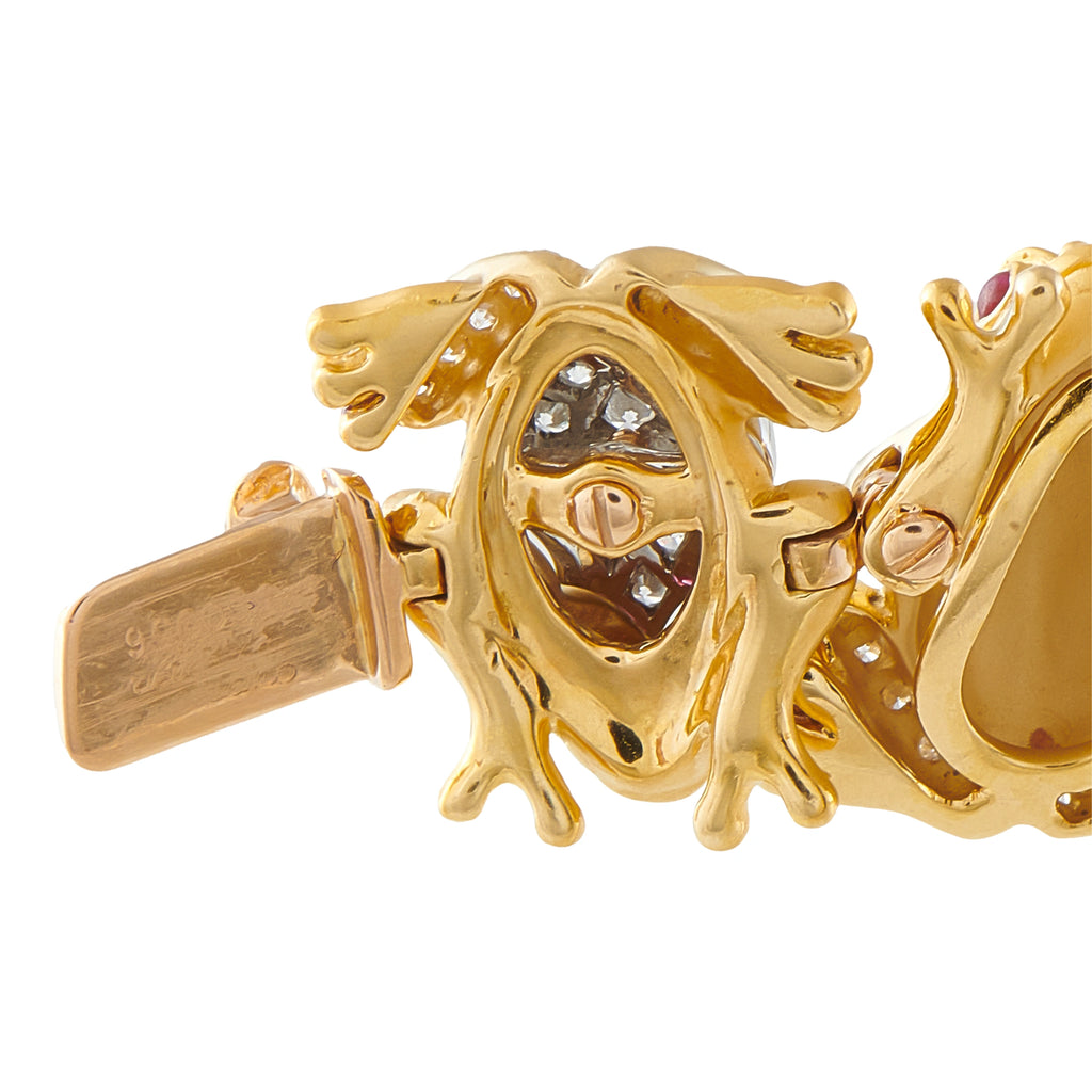 18K yellow gold frog bracelet with articulated clasp and clear gem-set frog details
