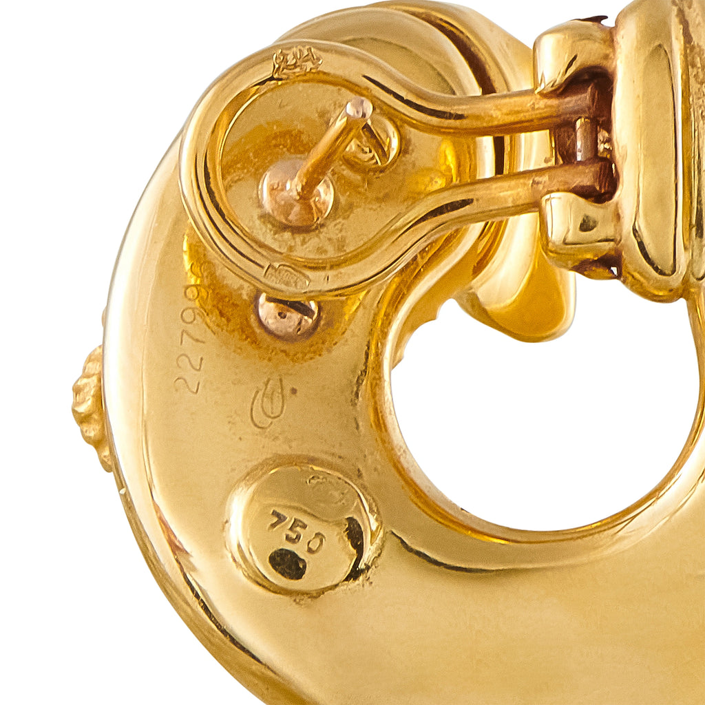 18K yellow gold elephant hoop earring, close-up of hinge and clasp detail