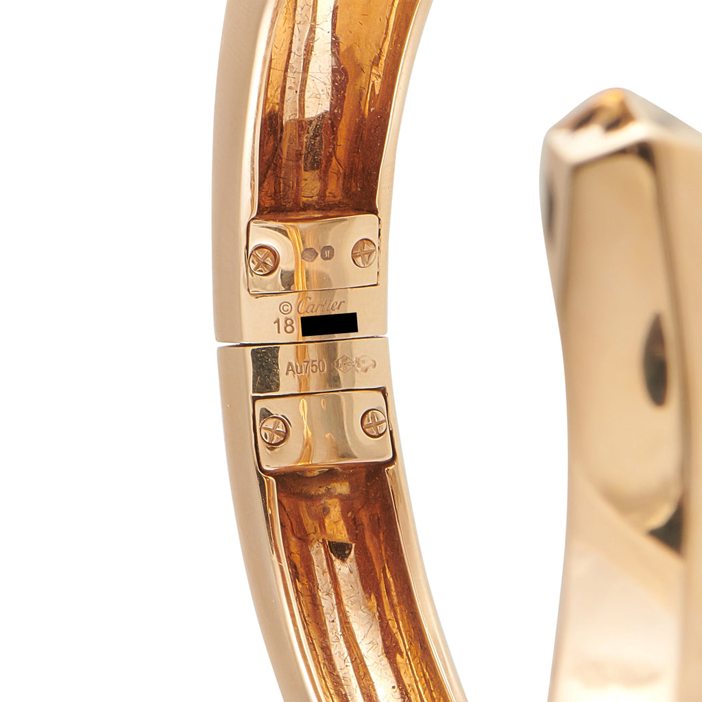 18K rose gold bracelet clasp with stamped markings, hinged mechanism